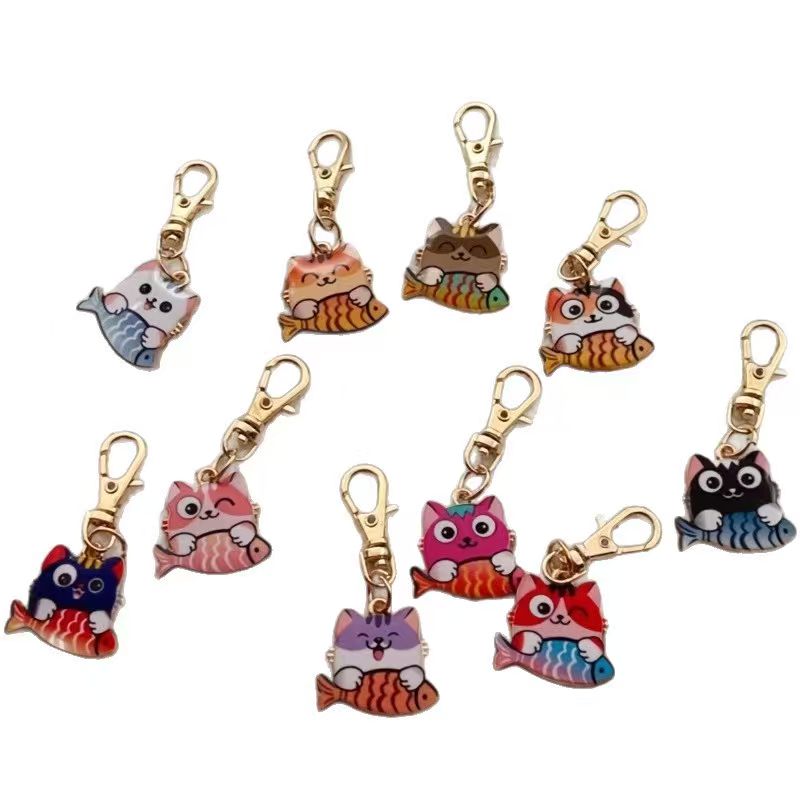 10pcs alloy printed cat keycha - Party Favor Bag recension och pris